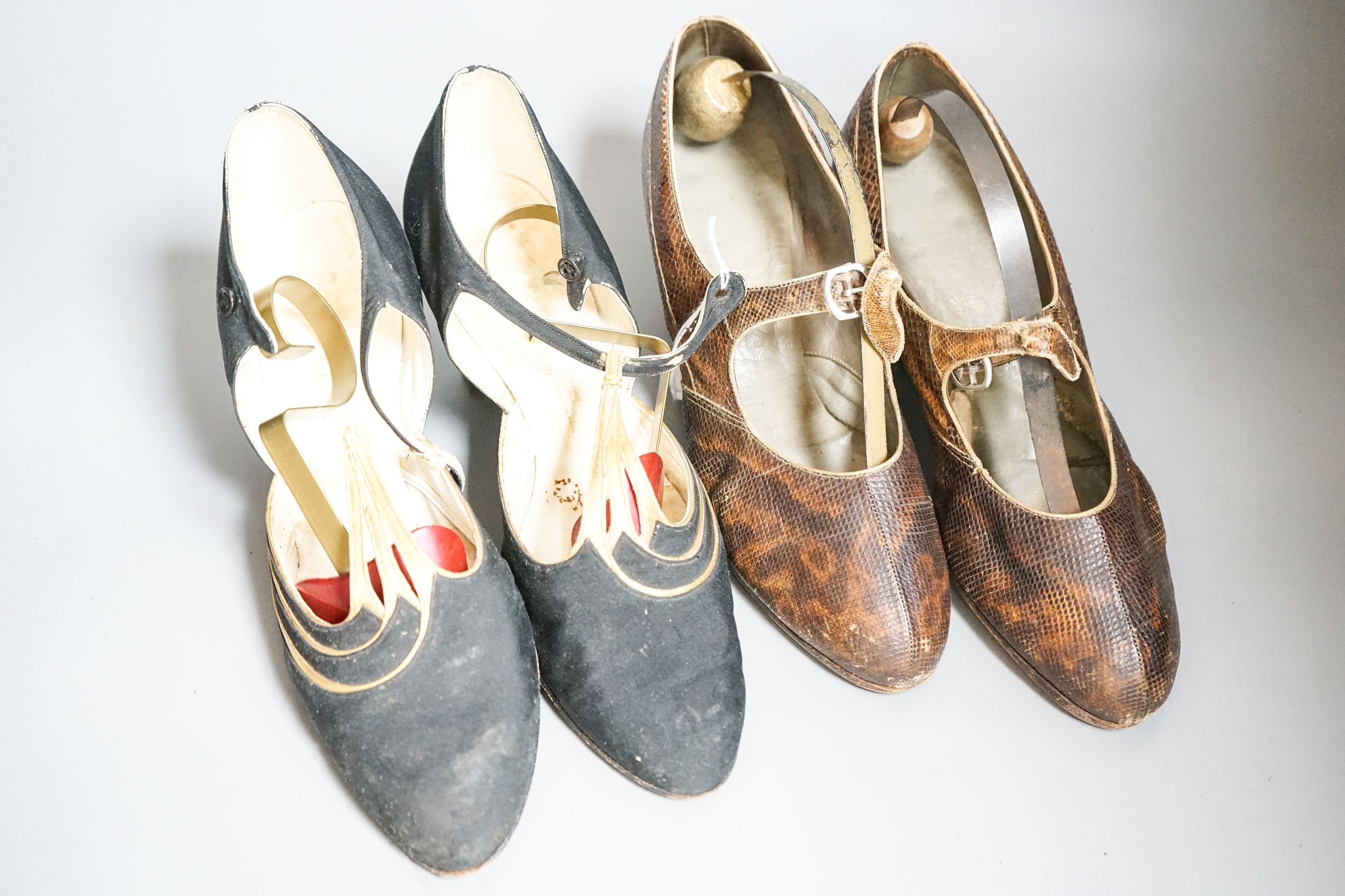 A pair of black silk and gold kid leather 1930's evening shoes and a similar pair of lizard and snakeskin shoes